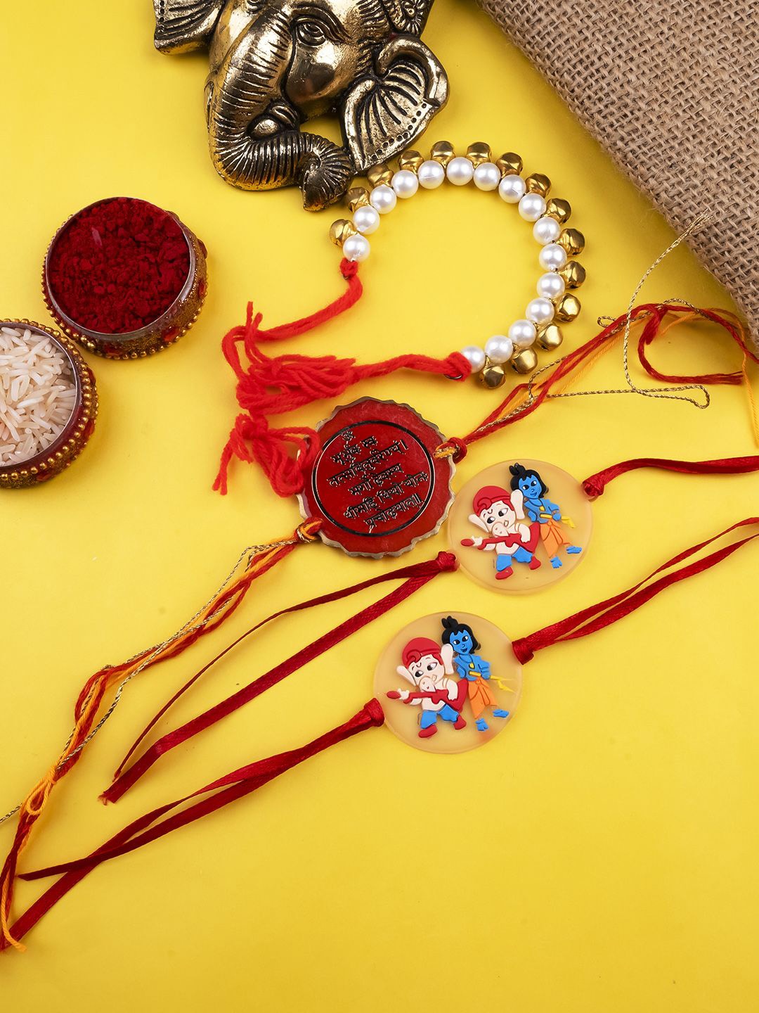 

StileAdda Set Of 4 Beaded Thread Rakhis With Roli & Chawal With Chandan And Mishri, Red