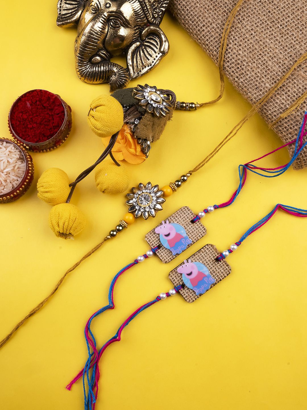 

StileAdda Set Of 4 Beaded Thread Rakhis With Roli & Chawal With Chandan And Mishri, Blue