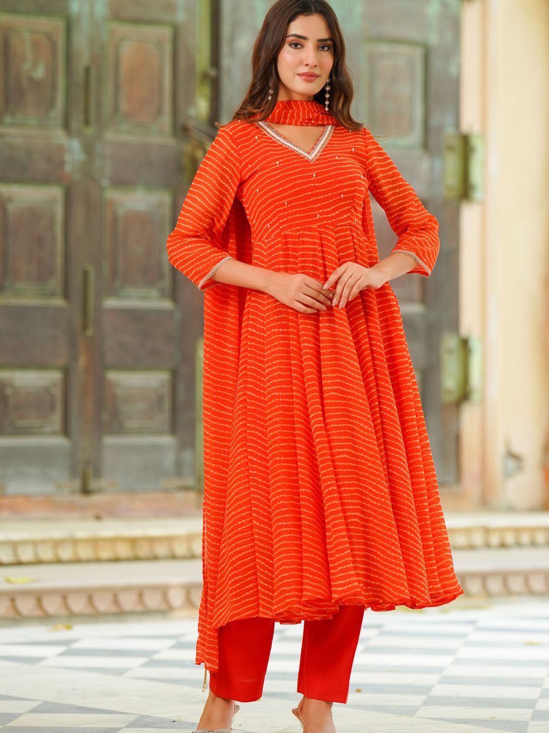 

Ambraee Leheriya Printed Regular Sequinned Kurta with Trousers & With Dupatta, Orange