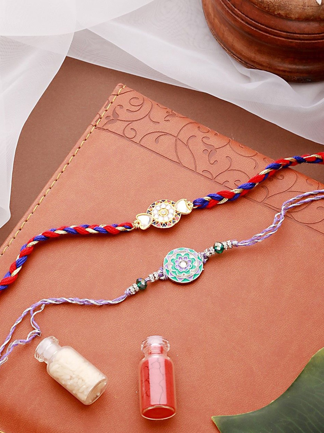 

Jazz and Sizzle Set Of 2 Beaded Thread Rakhis with Roli Chawal, Red