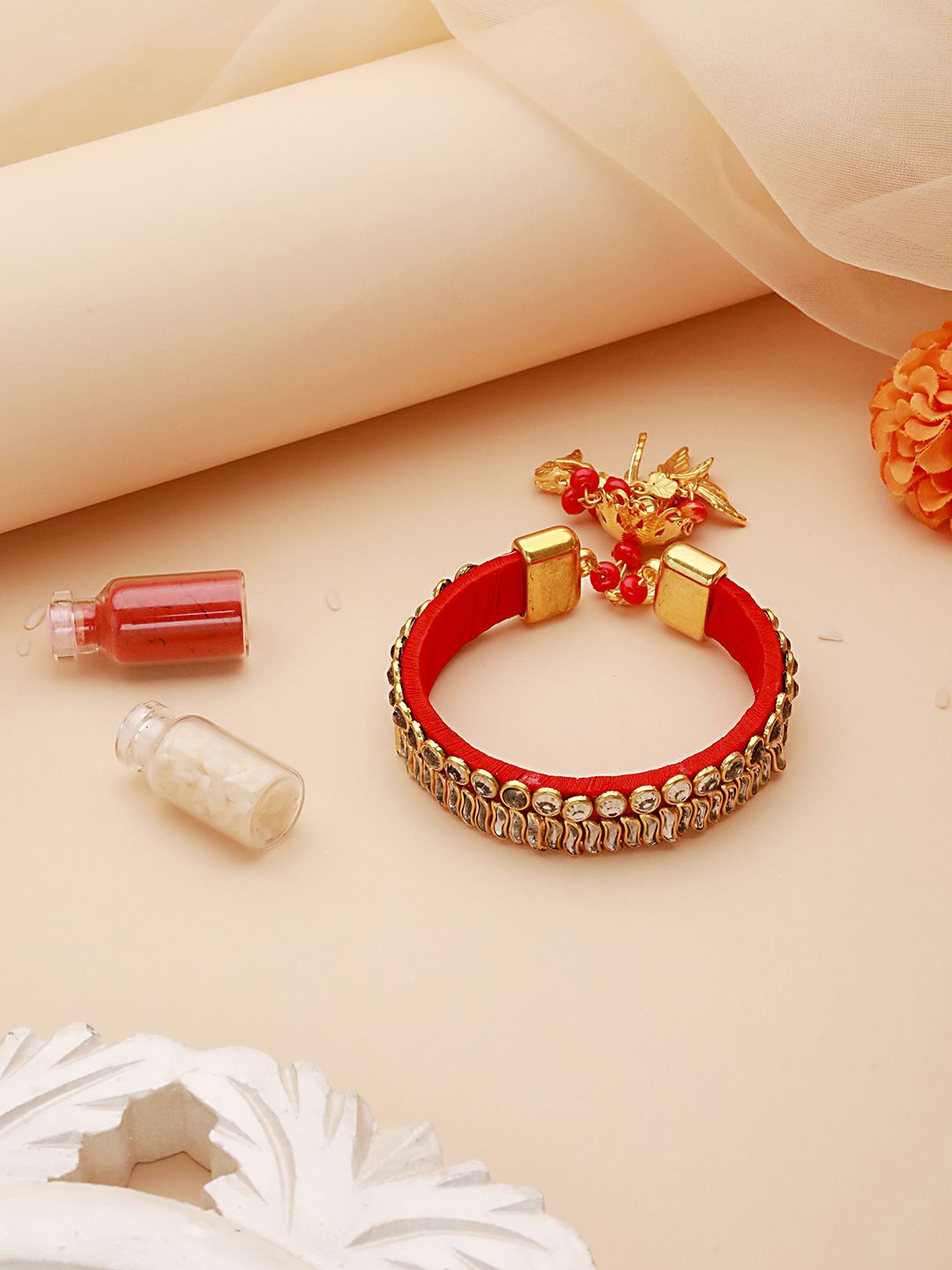 

Jazz and Sizzle Kundan Studded Bangle- Style Wraparound Bhabhi Rakhi With Roli Chawal, Red
