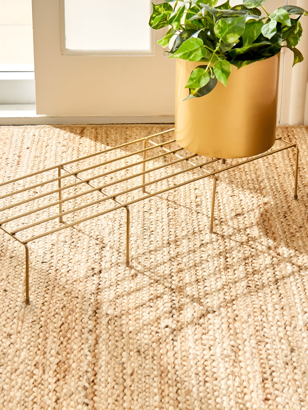 

Home Centre Gold toned Metal Planter Stand
