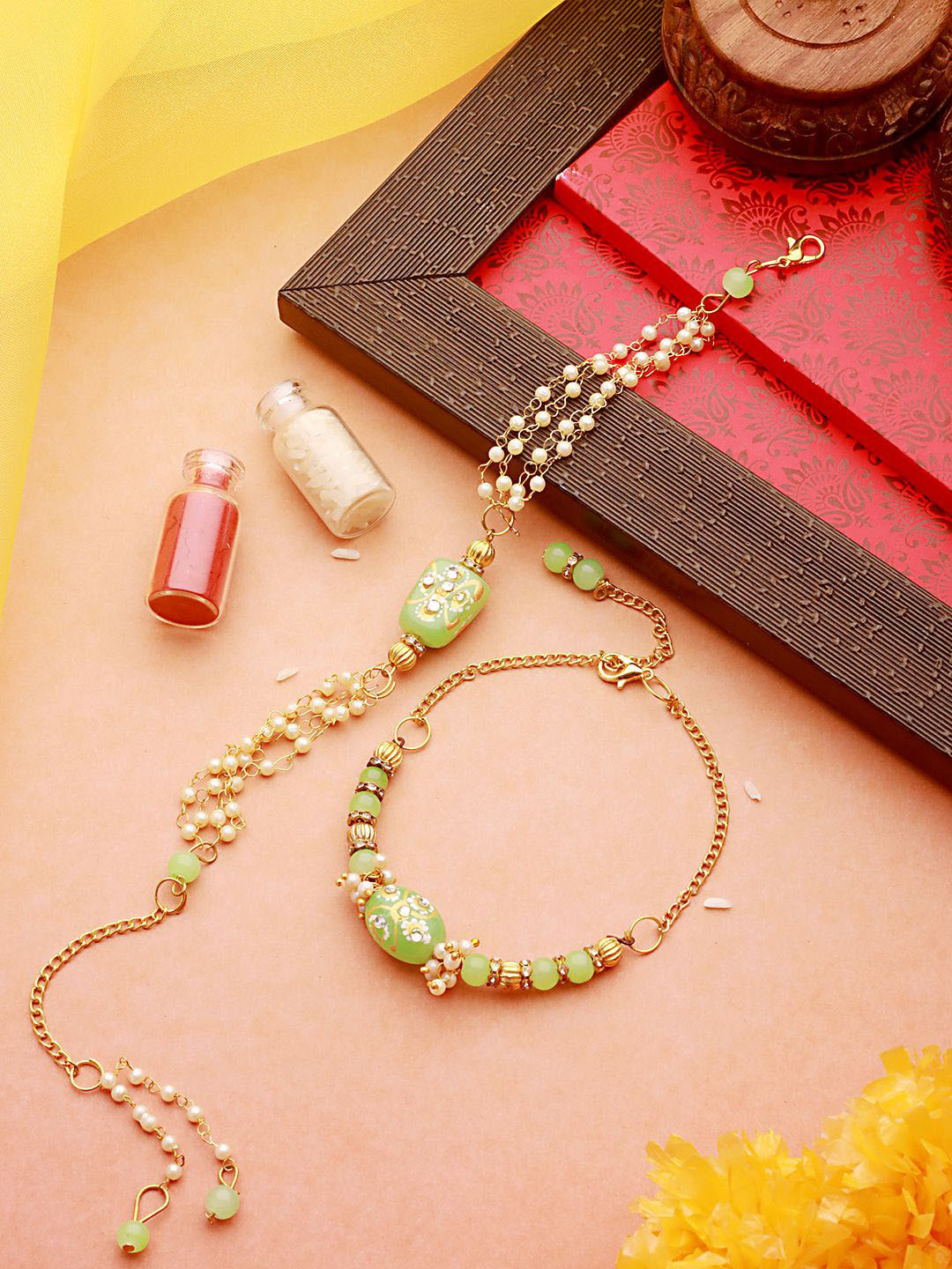 

Jazz and Sizzle Kundan Studded & Faux Pearl Beaded Bhaiya Bhabhi Rakhi With Roli Chawal, Gold