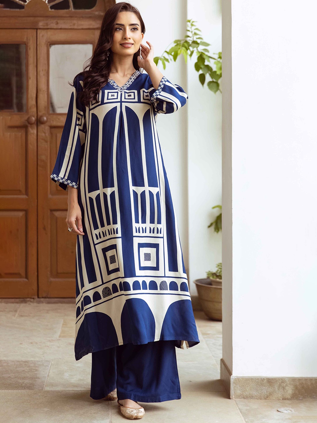 

KALINI Geometric Printed Sequinned V-Neck Straight Kurta With Palazzos, Blue
