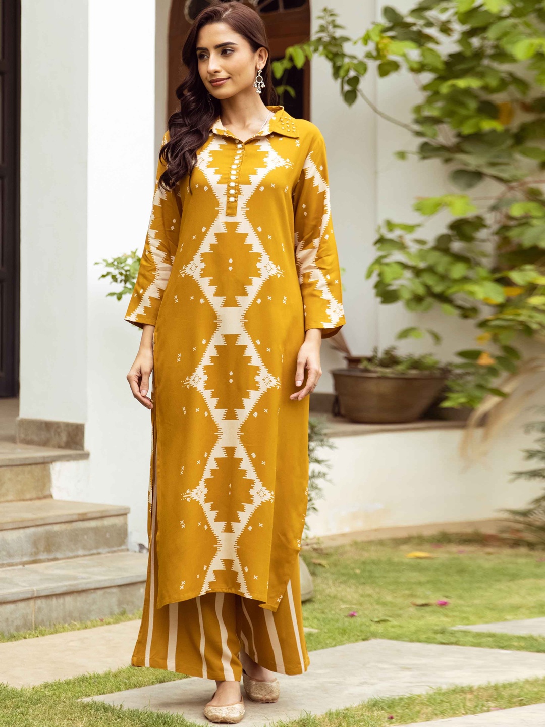 

KALINI Geometric Printed Beads and Stones Straight Kurta With Palazzos, Mustard