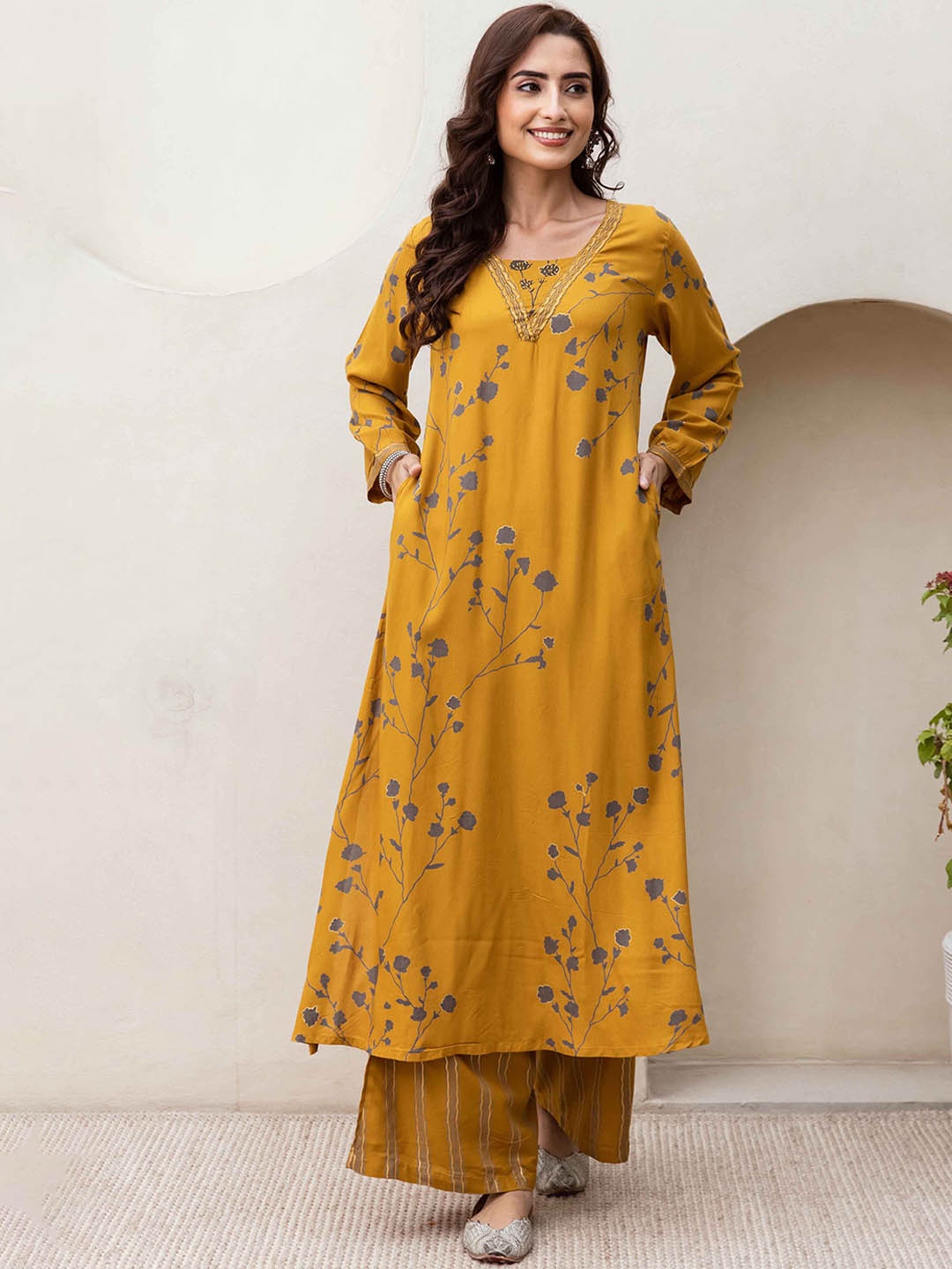 

Nehamta Floral Printed A-Line Beads and Stones Kurta with Palazzos, Mustard