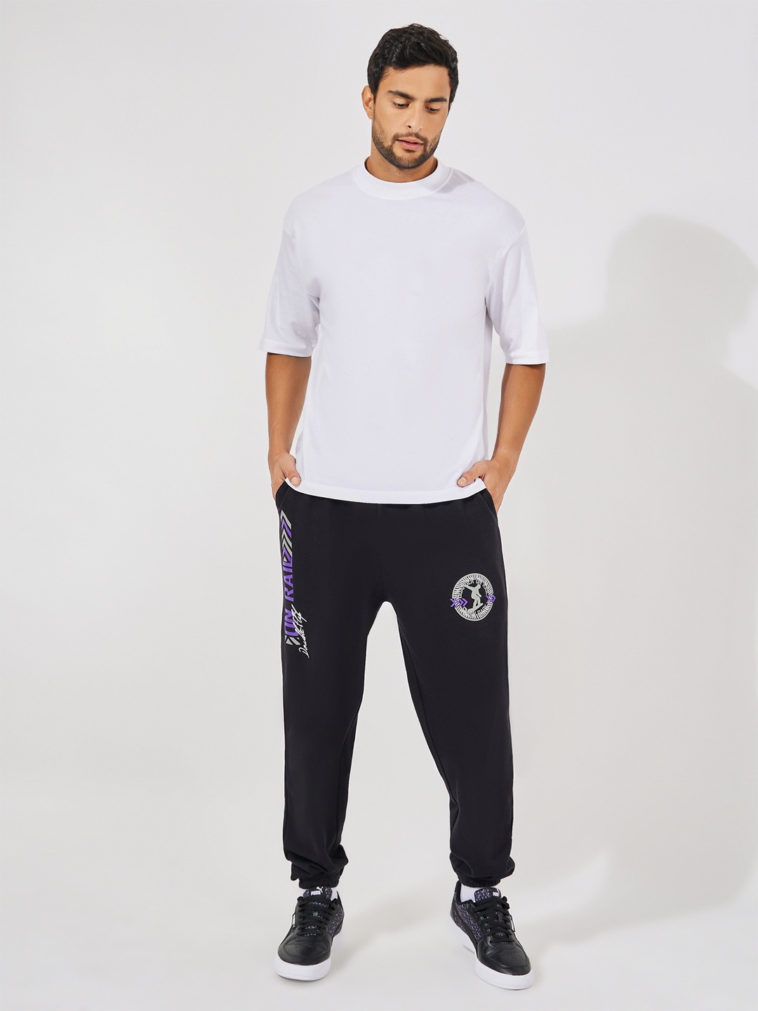 

Styli Men Varsity Printed Elasticated Hem Oversized Joggers, Black