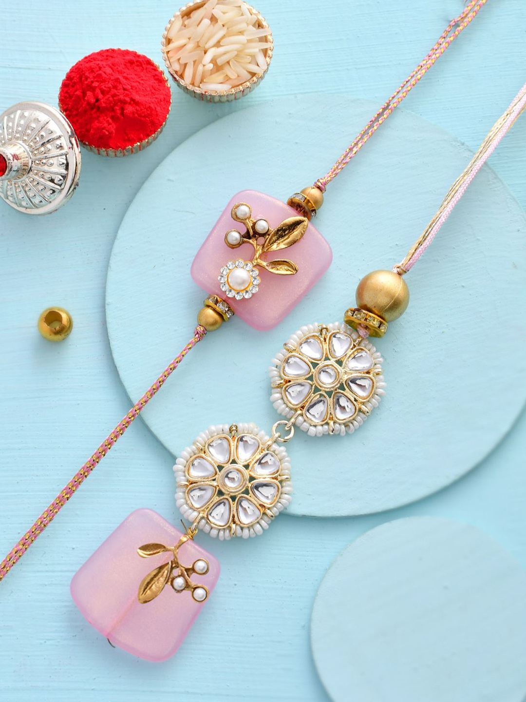 

Aapno Rajasthan Bhaiya Bhabhi Rakhi With Beautiful Box & Roli Chawal, Pink