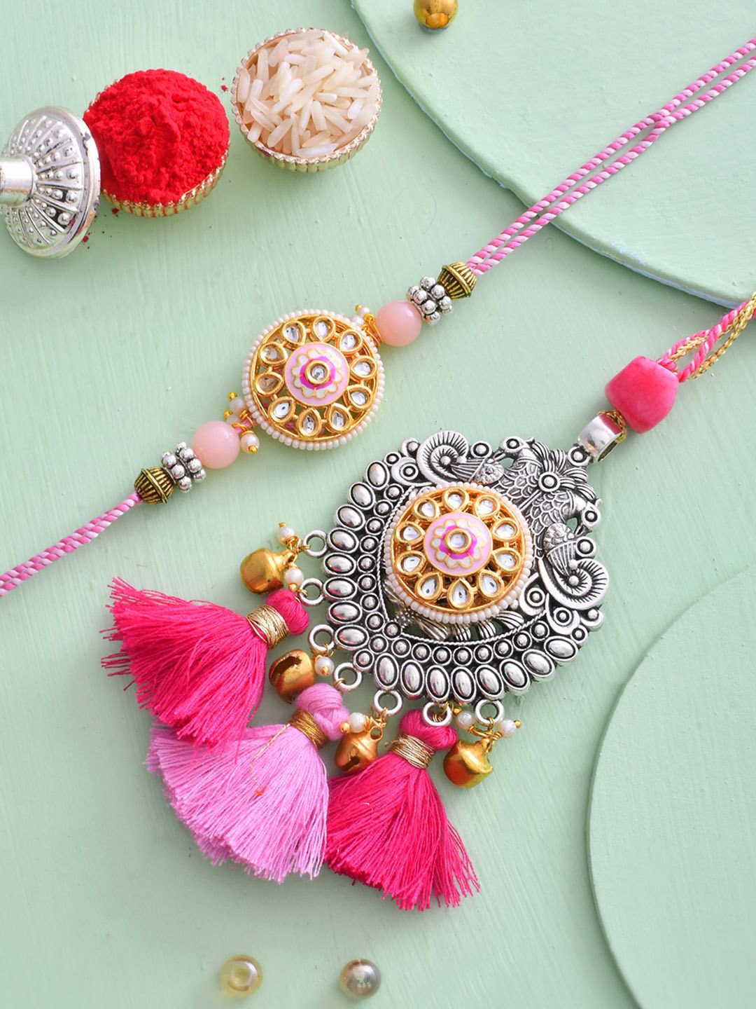 

Aapno Rajasthan Bhaiya Bhabhi Rakhi With Beautiful Box & Roli Chawal, Pink