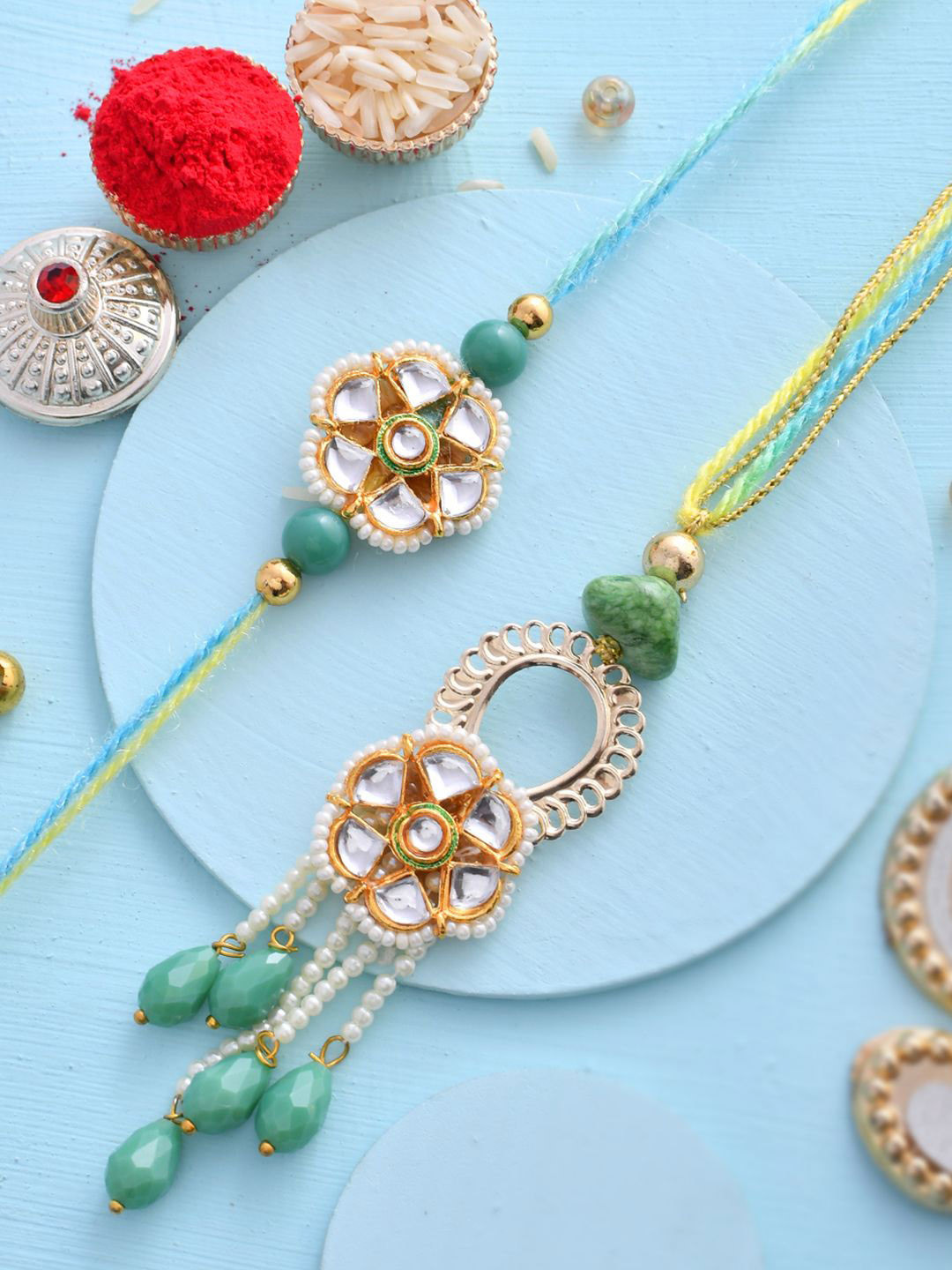 

Aapno Rajasthan Stone Studded & Beaded Bhaiya Bhabhi Thread Rakhis with Roli Chawal, Green