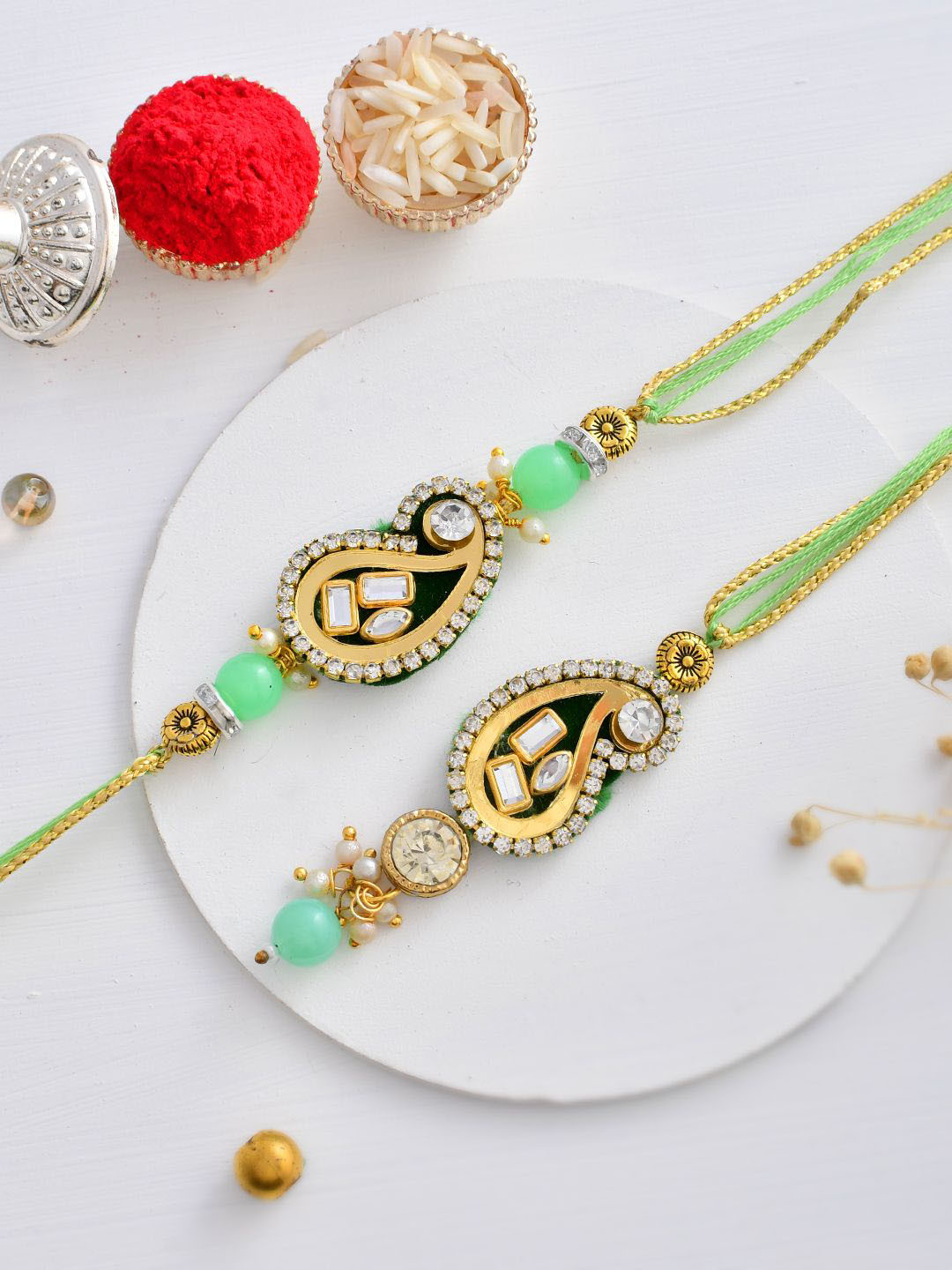 

Aapno Rajasthan Stone Studded & Beaded Bhaiya Bhabhi Thread Rakhis with Roli Chawal, Green