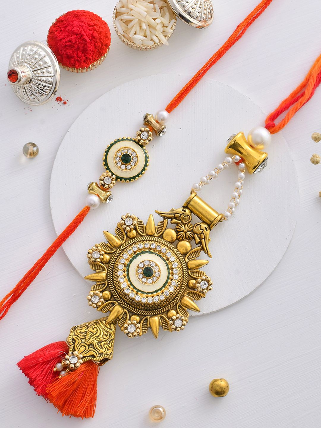 

Aapno Rajasthan Stone Studded & Beaded Bhaiya Bhabhi Thread Rakhis with Roli Chawal, Gold