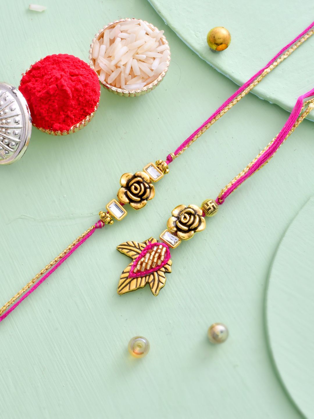 

Aapno Rajasthan Bhaiya Bhabhi Floral Studded Rakhi With Beautiful Box & Roli Chawal, Gold
