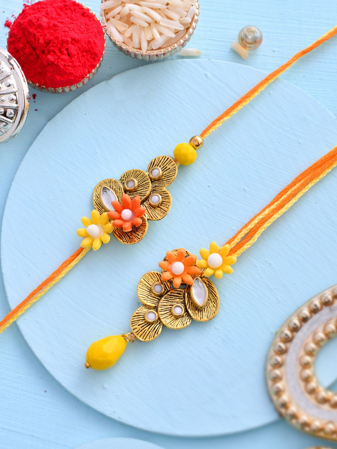 

Aapno Rajasthan Stone Studded & Beaded Bhaiya Bhabhi Thread Rakhis with Roli Chawal, Yellow