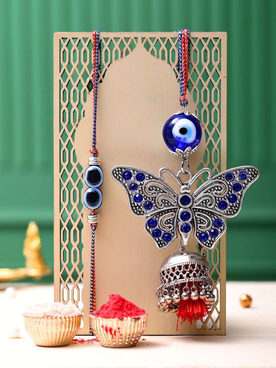 

Aapno Rajasthan Evil Eye Stone Studded & Beaded Bhaiya Bhabhi Thread Rakhis, Silver