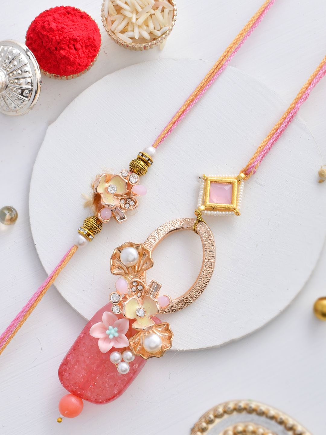 

Aapno Rajasthan Pearl Beaded Bhaiya Bhabhi Rakhi Set with Box, Pink