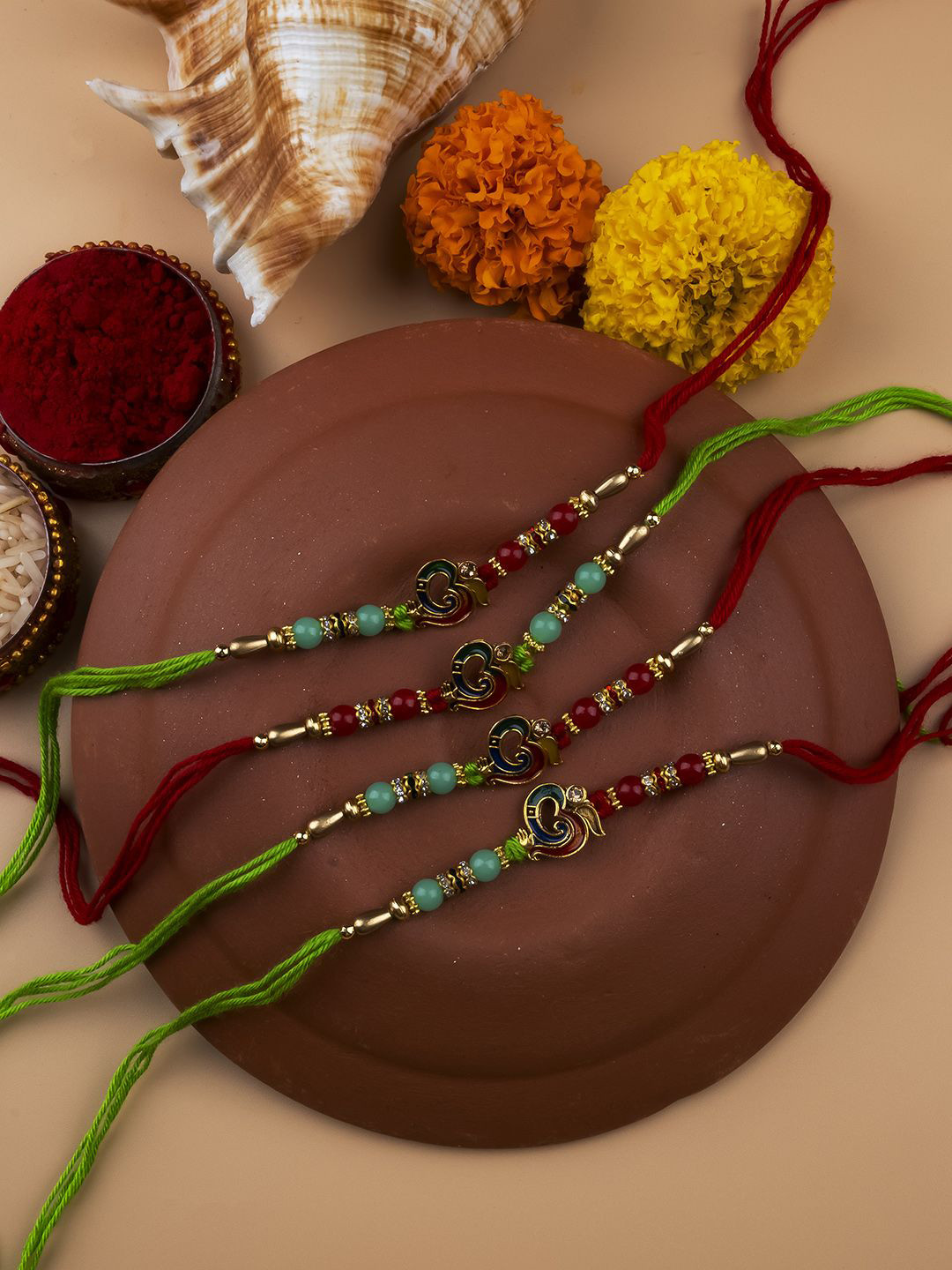 

StileAdda Set of 4 Bhai Bhabhi Beaded Thread Rakhis With Roli Chawal, Green
