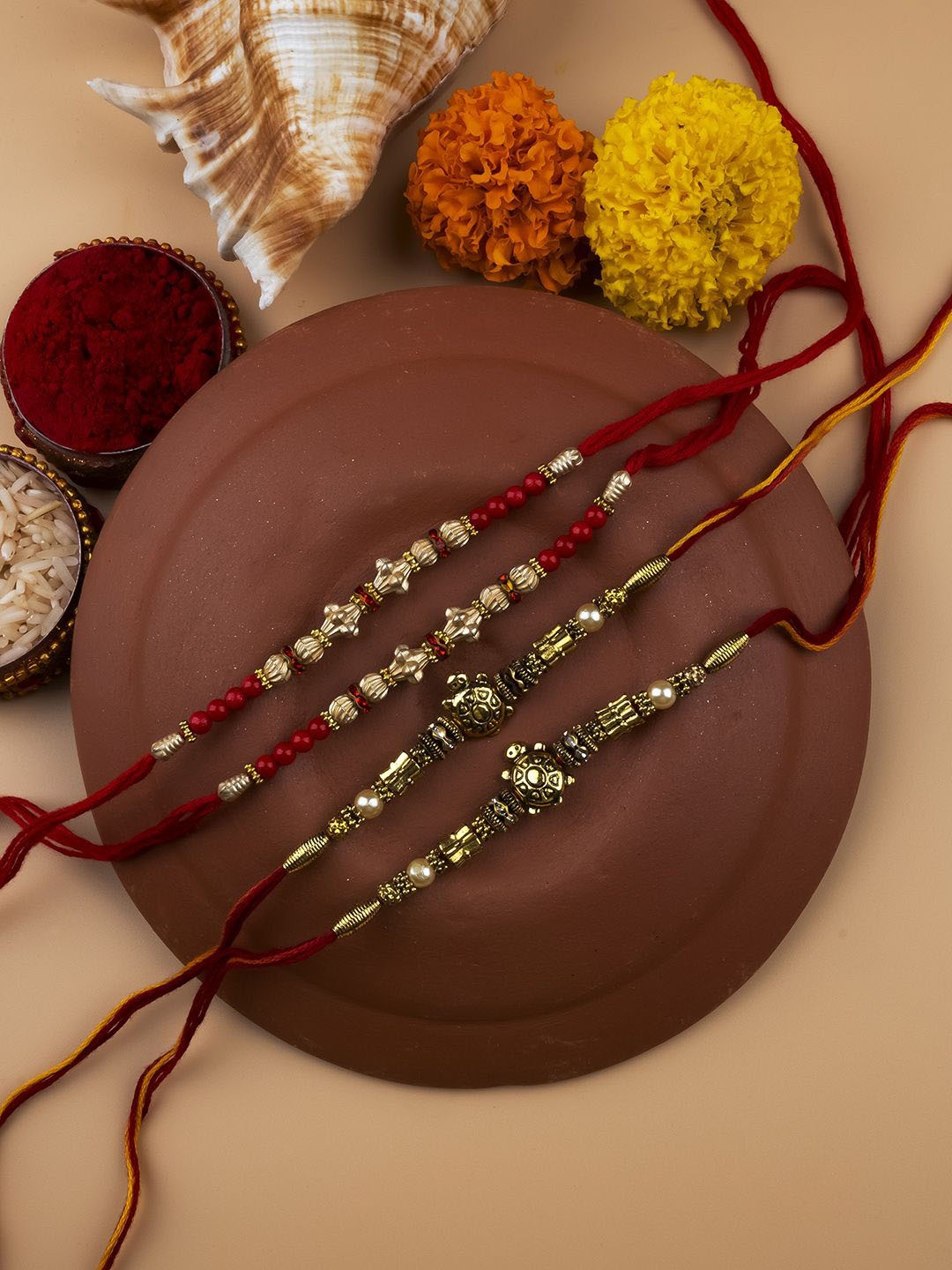 

StileAdda Set of 4 Bhai Bhabhi Beaded Thread Rakhis With Roli Chawal, Red