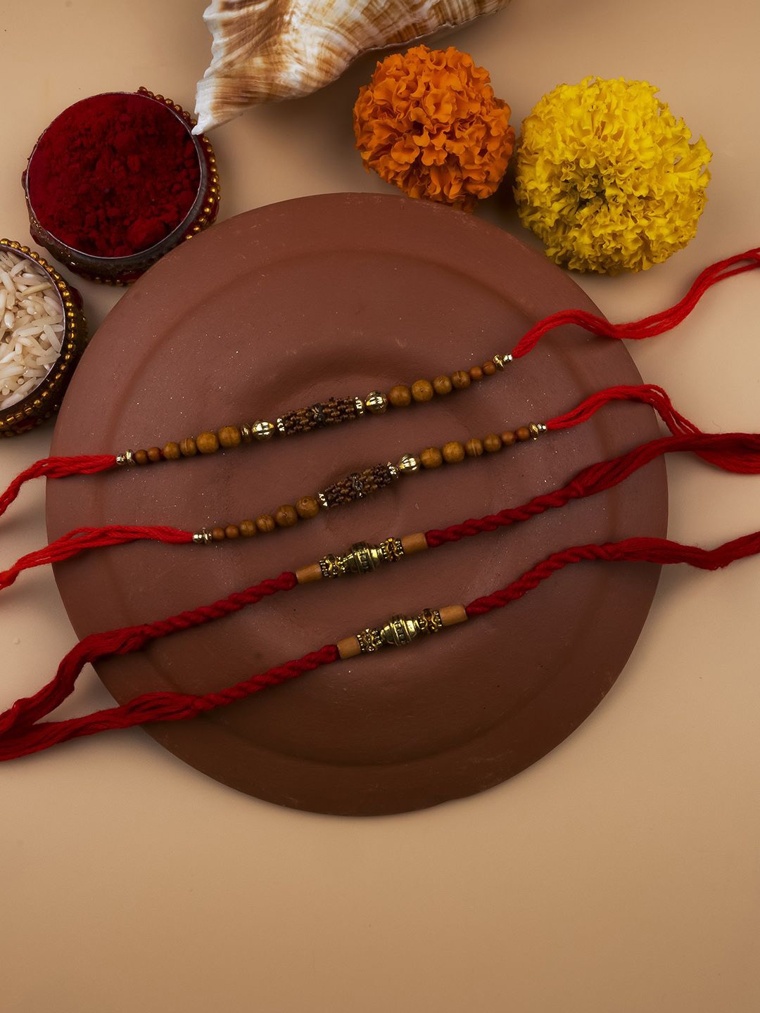 

StileAdda Set of 4 Bhai Bhabhi Beaded Thread Rakhis With Roli Chawal, Red