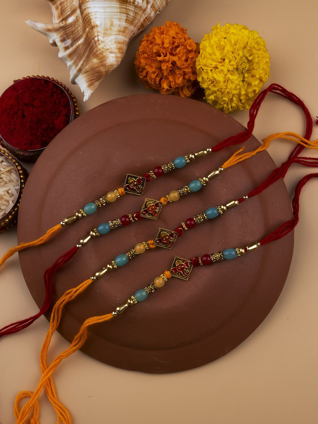 

StileAdda Set of 4 Bhai Bhabhi Beaded Thread Rakhis With Roli Chawal, Brown