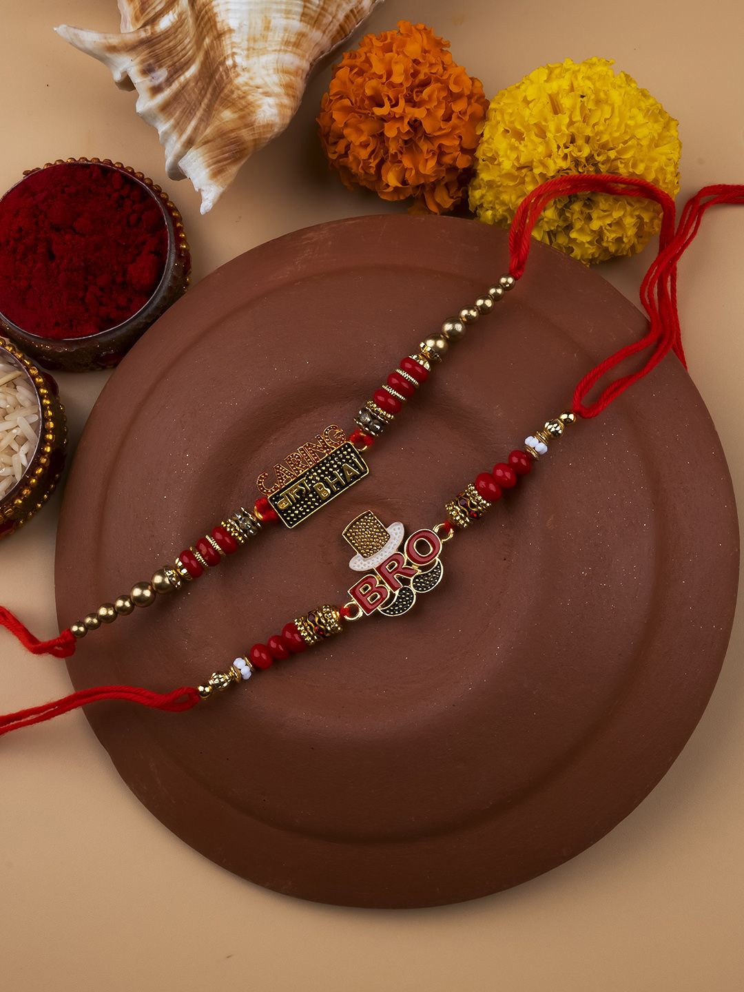 

StileAdda Set Of 2 Beaded Thread Rakhis With Roli & Chawal With Chandan And Mishri, Red