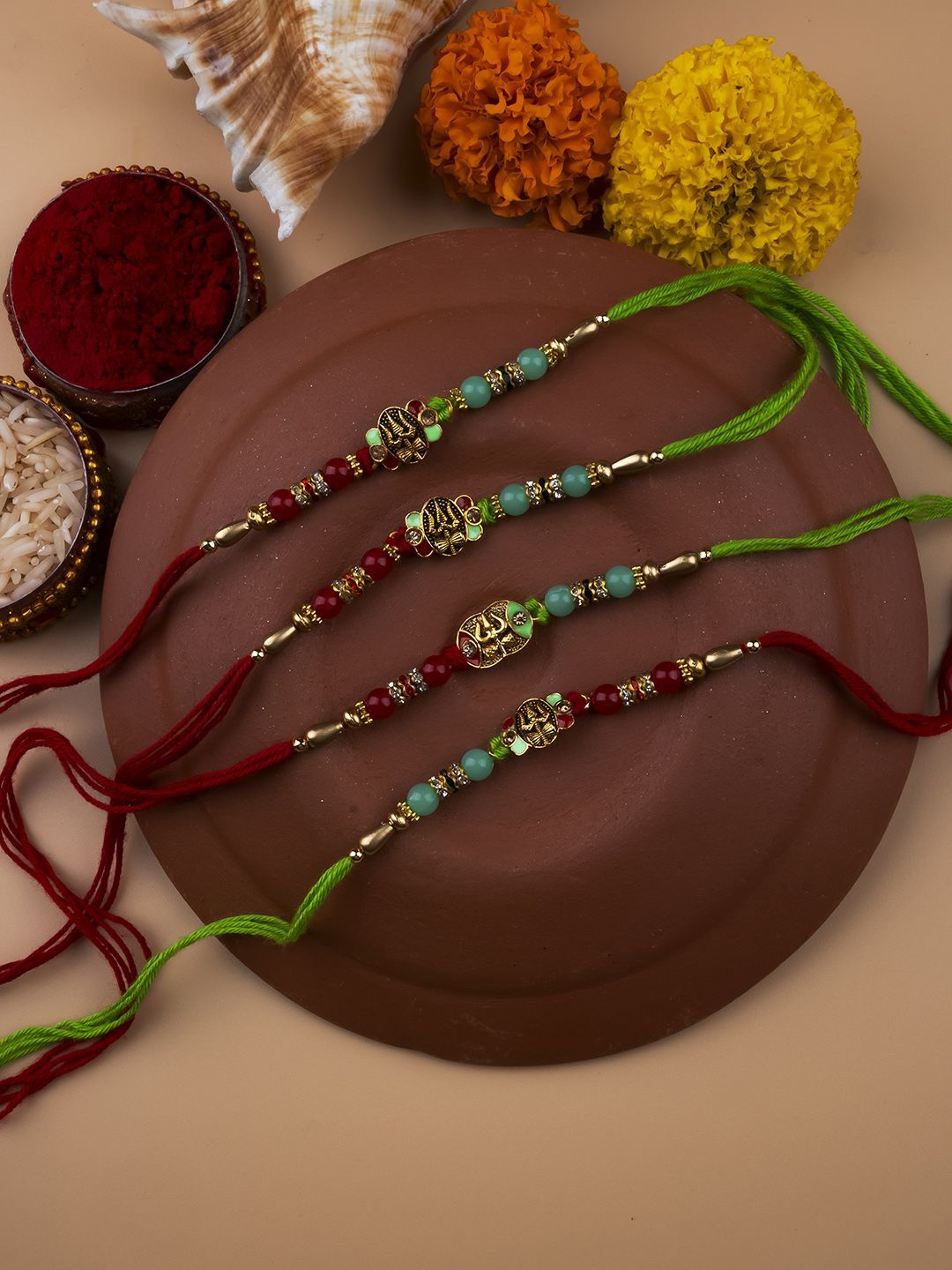 

StileAdda Set of 4 Bhai Bhabhi Beaded Thread Rakhis With Roli Chawal, Red
