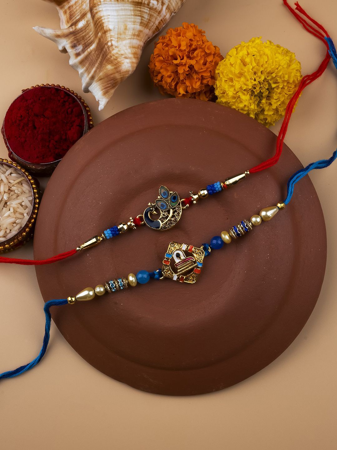 

StileAdda Set Of 2 Beaded Thread Rakhis With Roli & Chawal With Chandan And Mishri, Blue