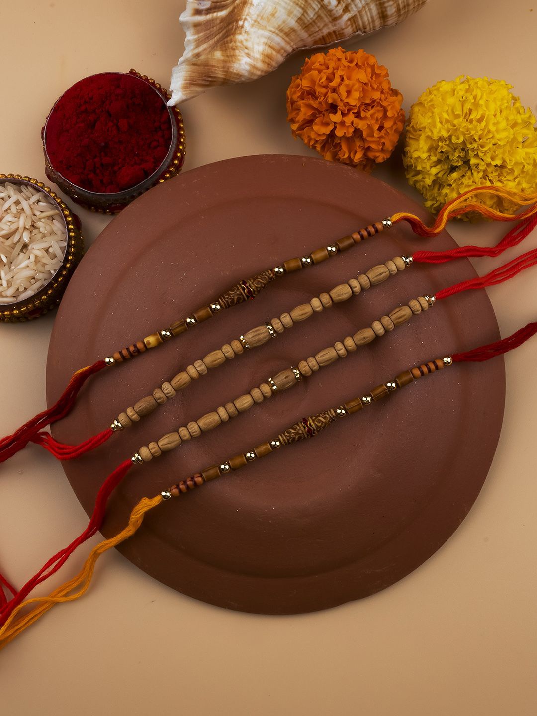 

StileAdda Set Of 4 Beaded Thread Rakhis With Roli & Chawal With Chandan And Mishri, Red