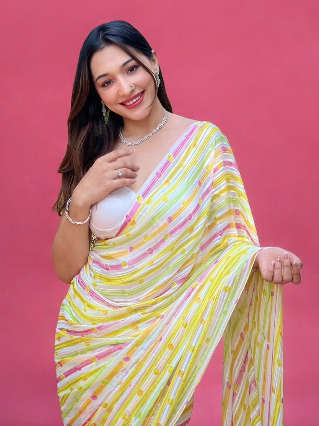 

Vastrasky Global Printed Poly Georgette Saree, Yellow
