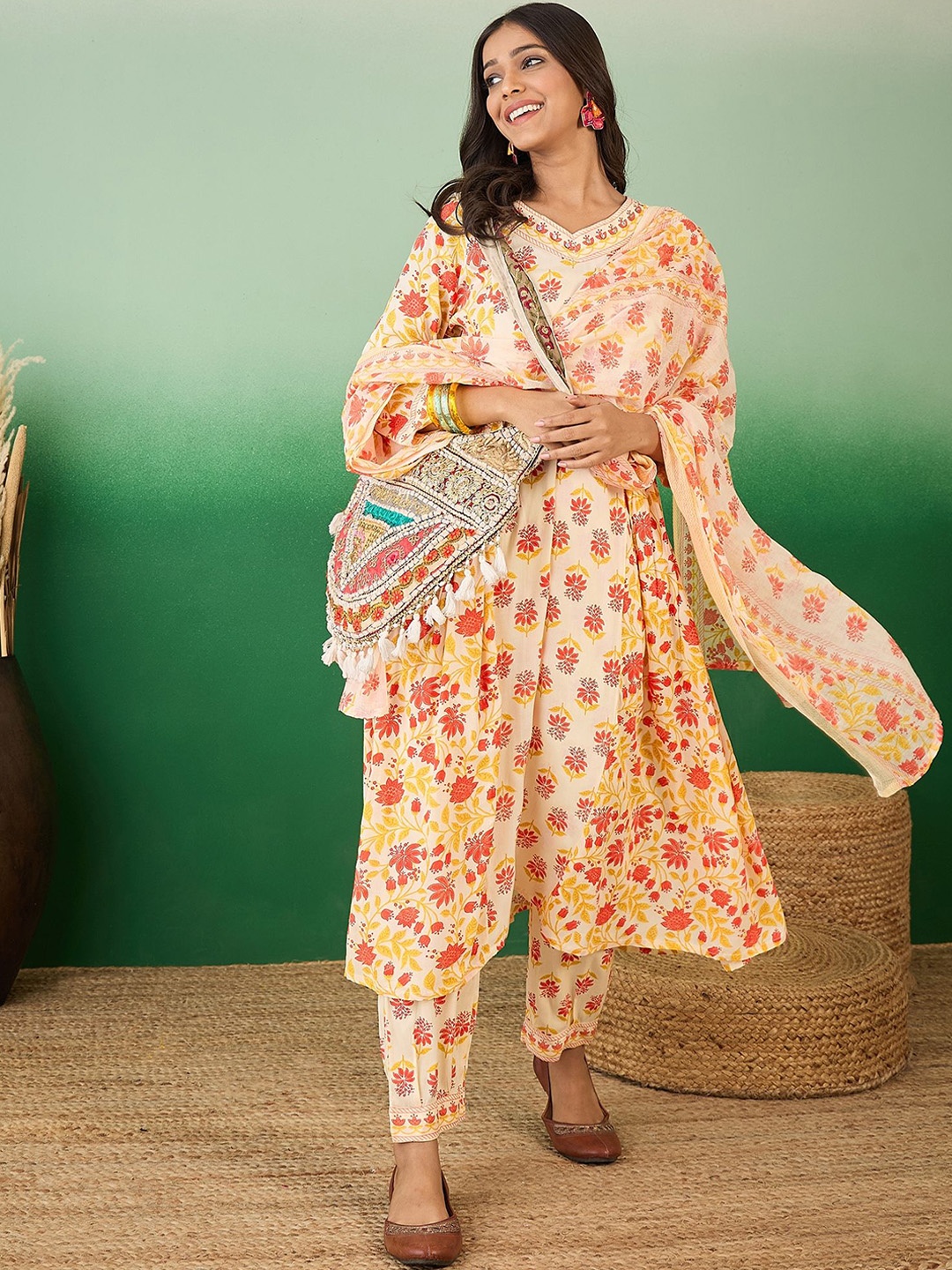 

Sangria Yellow Floral Printed A-line Kurta With Trouser & Dupatta