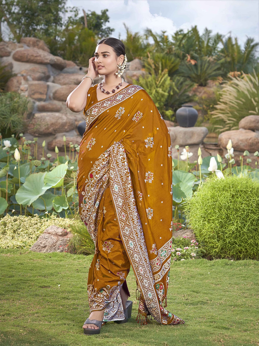 

MANOHARI Ethnic Motifs Woven Designed Zari Heavy Work Banarasi Saree, Mustard