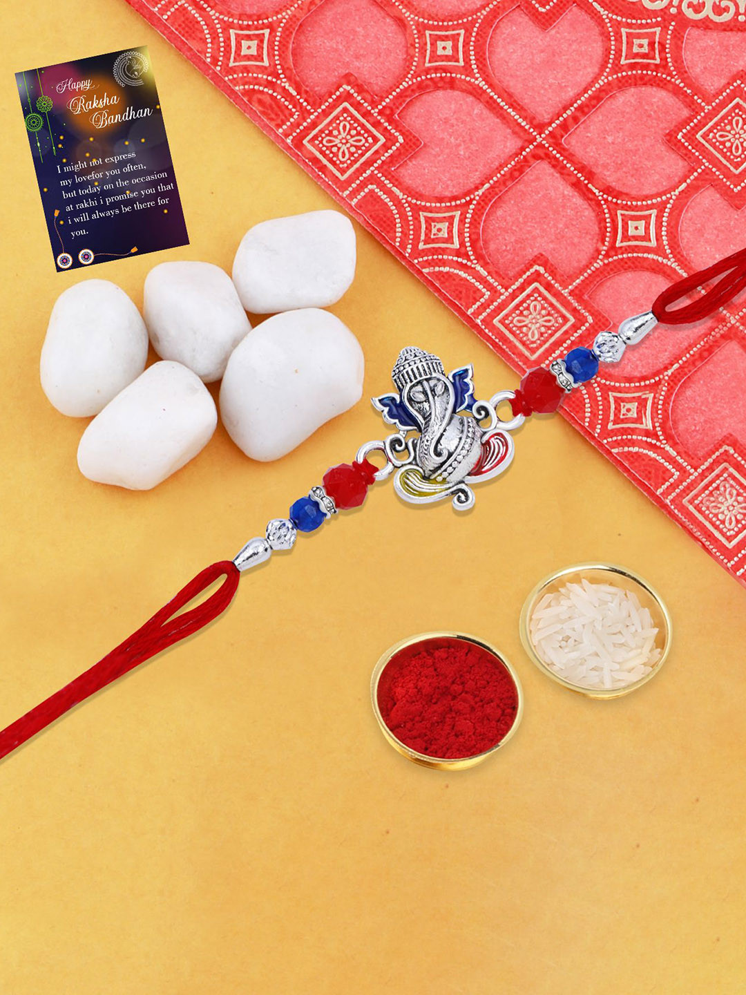 

Silver Shine Beaded Lord Ganesh Rakhi With Roli Chawal & Greeting Card, Red