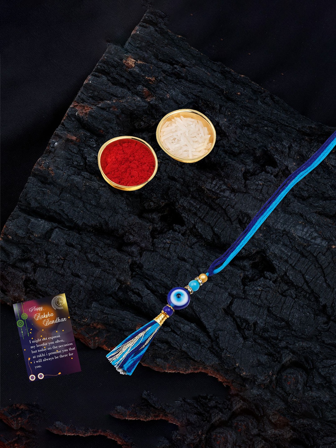

Silver Shine Evil Eye Bhabhi Rakhi With Roli Chawal & Greeting Card, Blue
