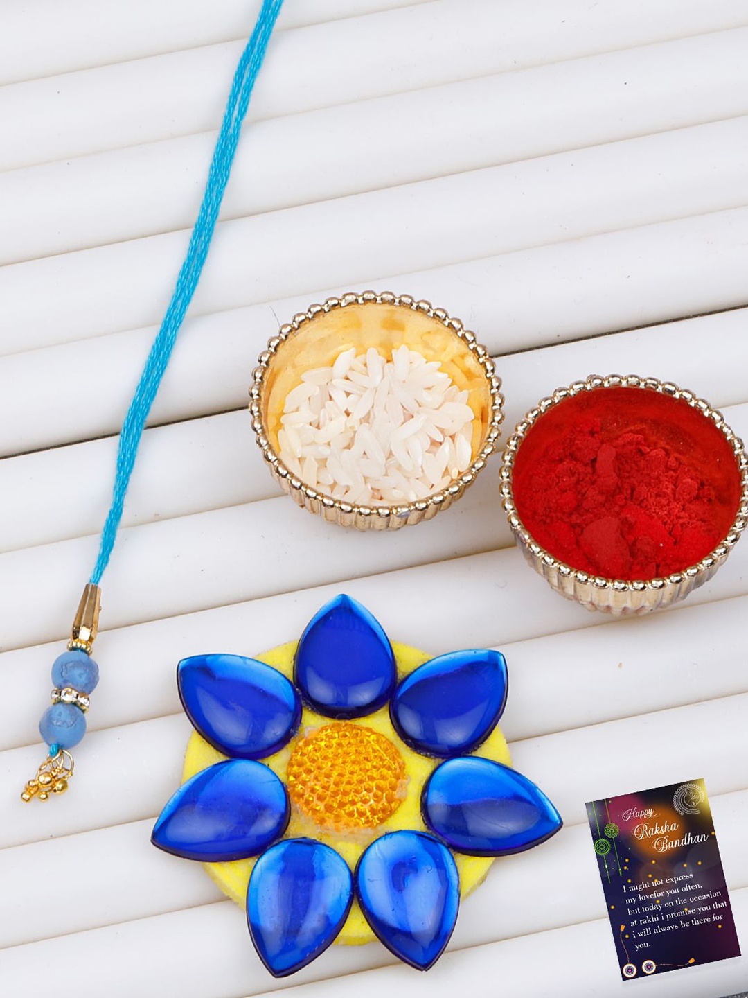 

Silver Shine Beaded Bhabhi Rakhi With Roli Chawal & Greeting Card, Blue