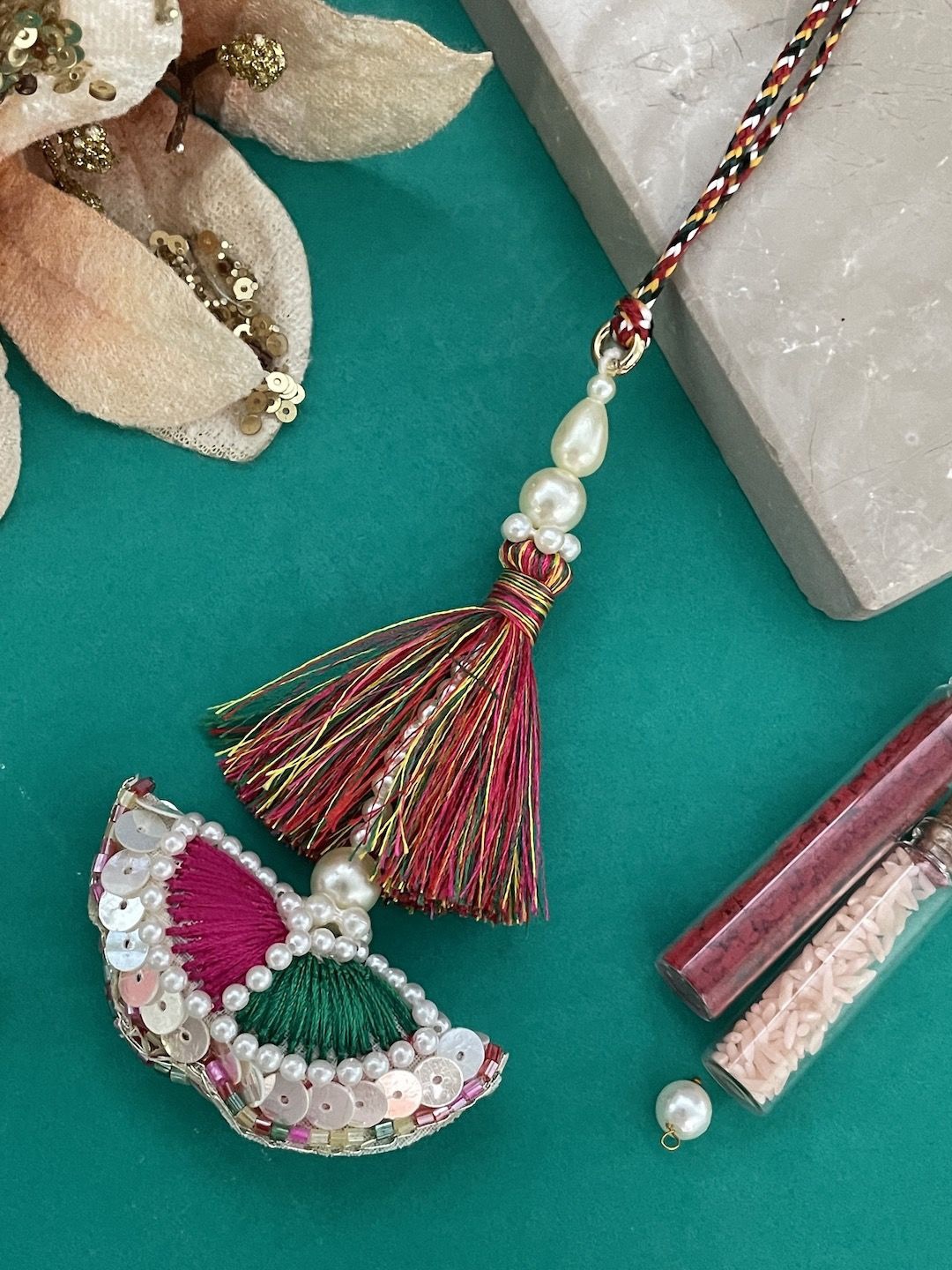 

Digital Dress Room Tassel & Pearls Beads Latkan Lumba Rakhis, Red