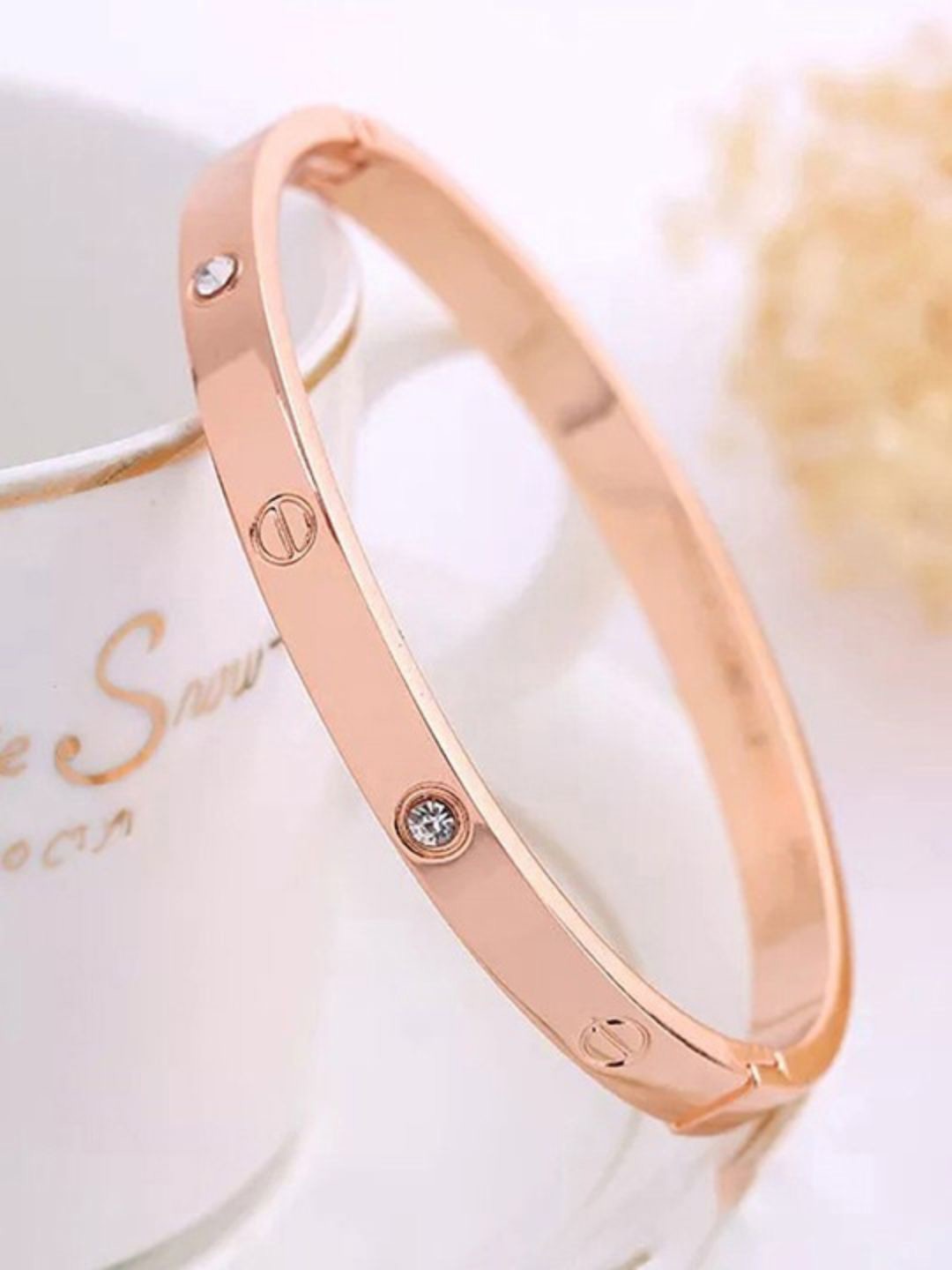 

DressBerry Rose Gold-Plated American Diamond Stone Studded Bangle-Style Bracelet