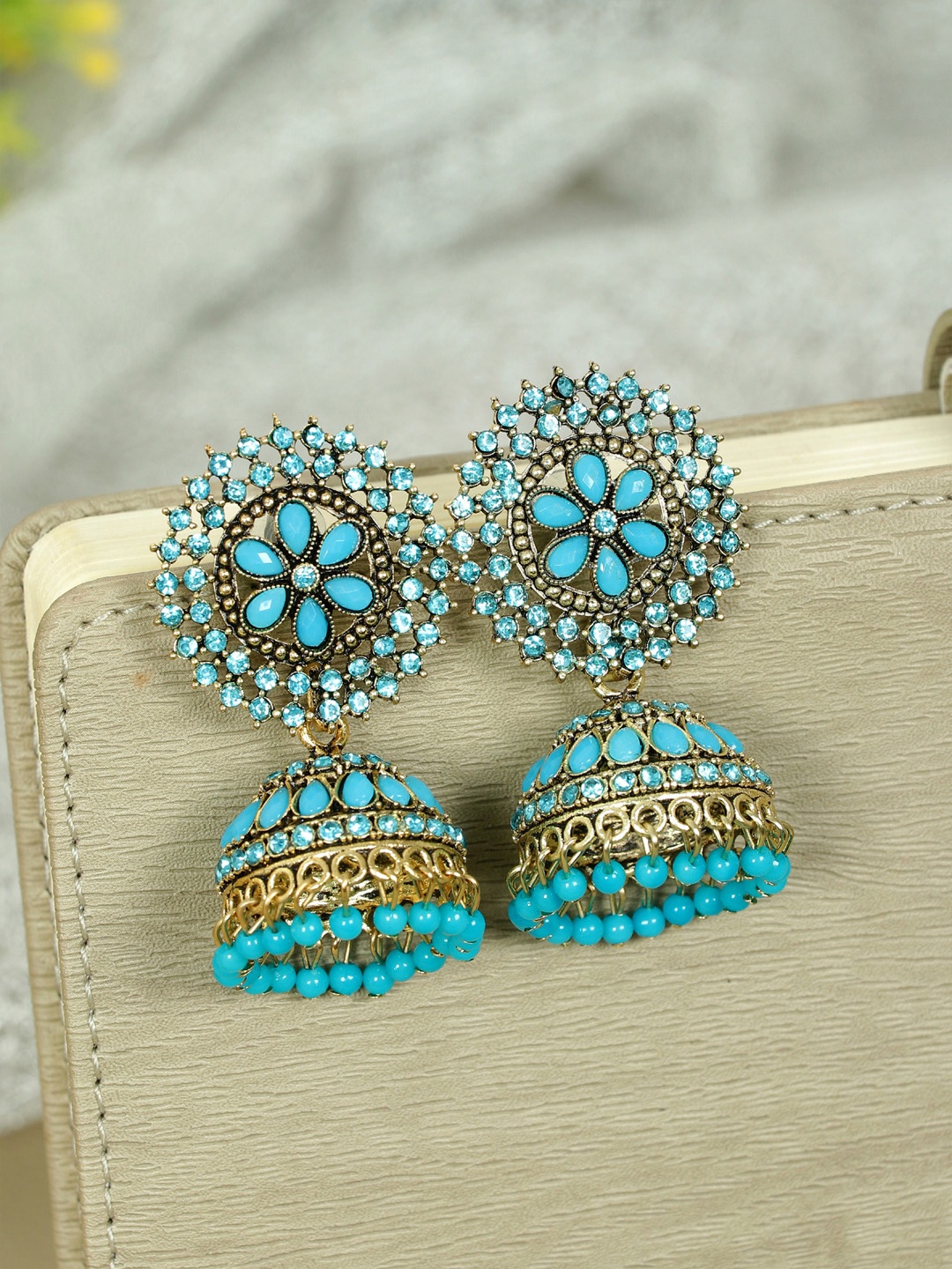 

Zoey Gold-Plated Kundan Studded Contemporary Jhumkas