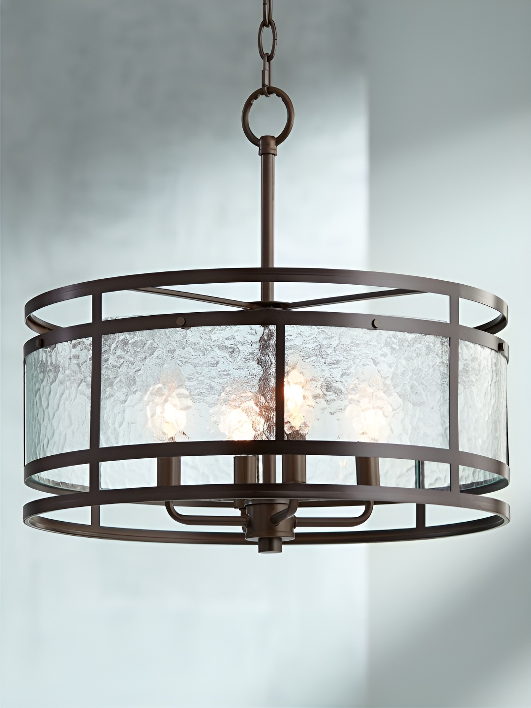 

The Art House Transparent & Brown Textured Aluminium Cylinder Shaped Ceiling Lamp