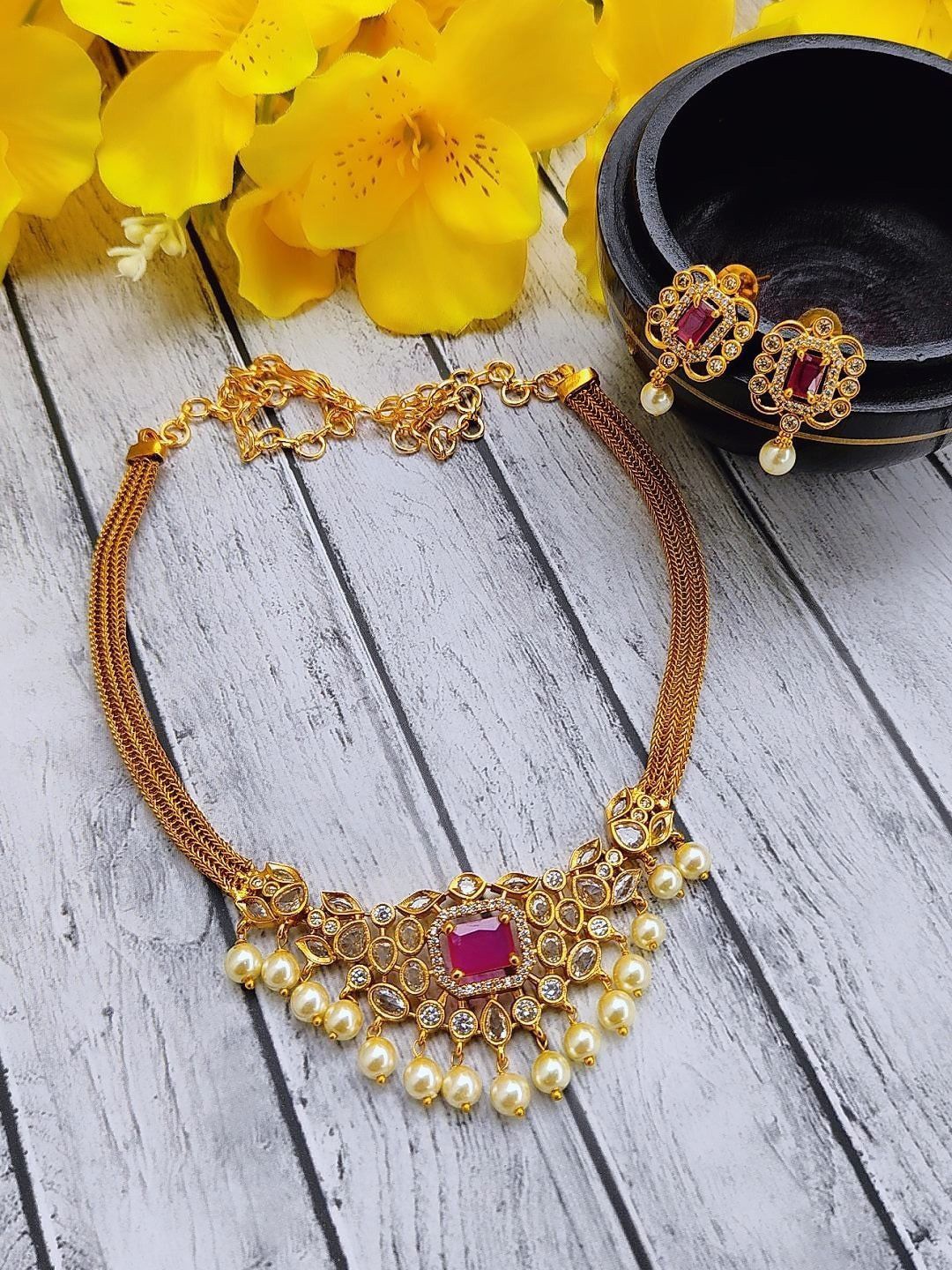 

Adc fashions Gold Plated Stones Studded & Beaded Flower Jewellery Set