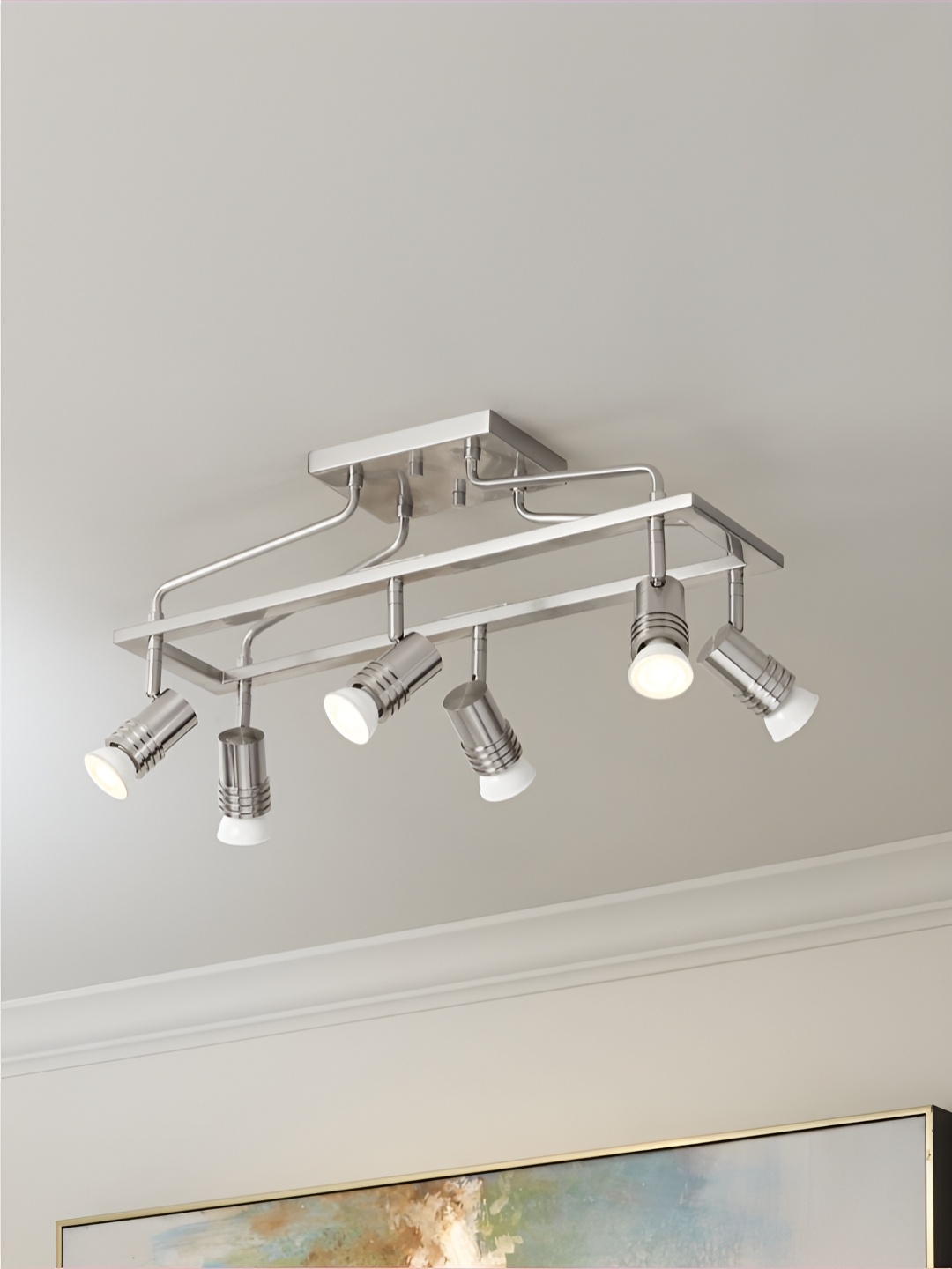 

The Art House Silver Toned & White Aluminium Abstract Shaped Ceiling Lamp
