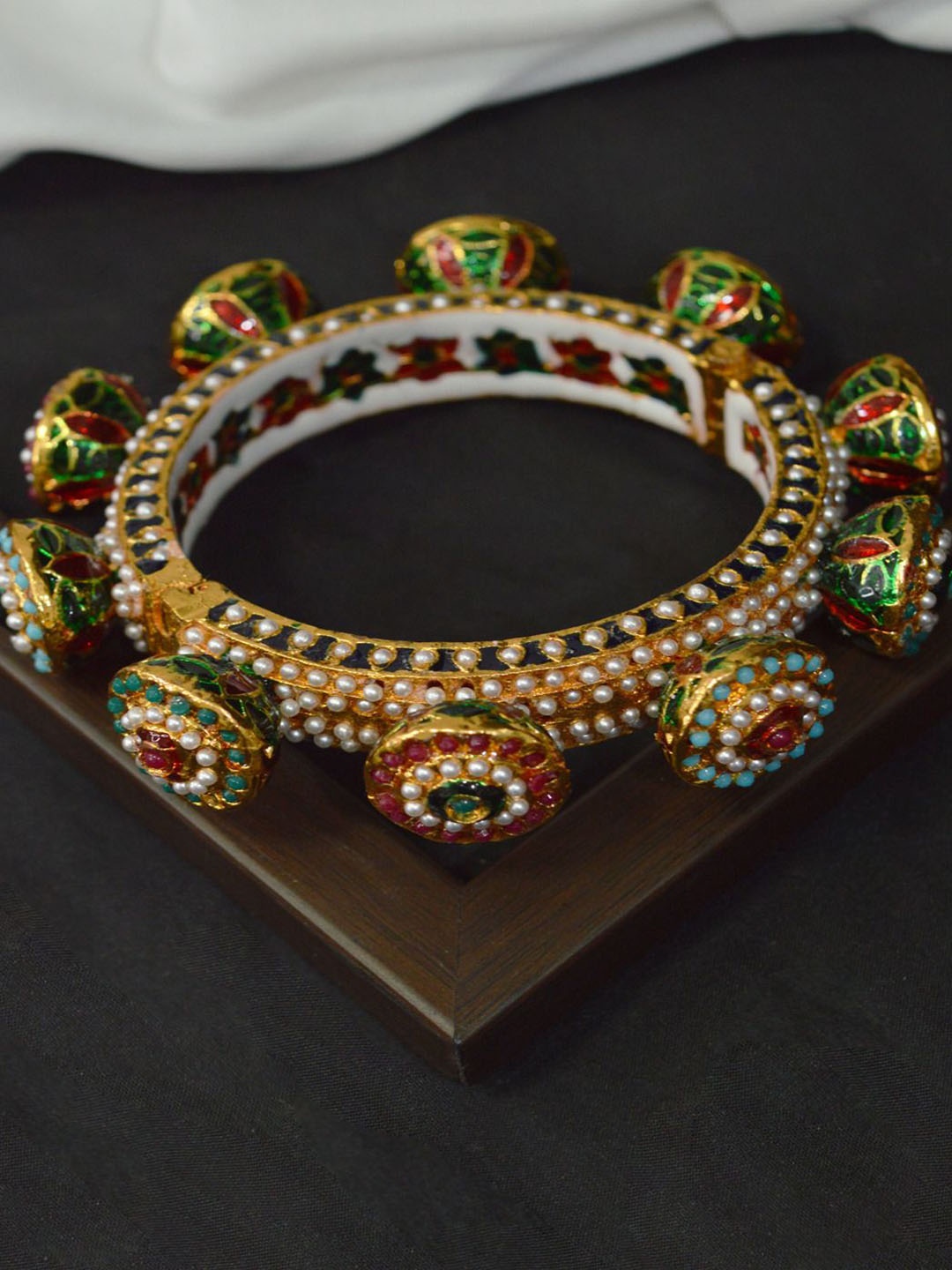 

Niscka Gold Plated Stone Studded Beaded Bangle