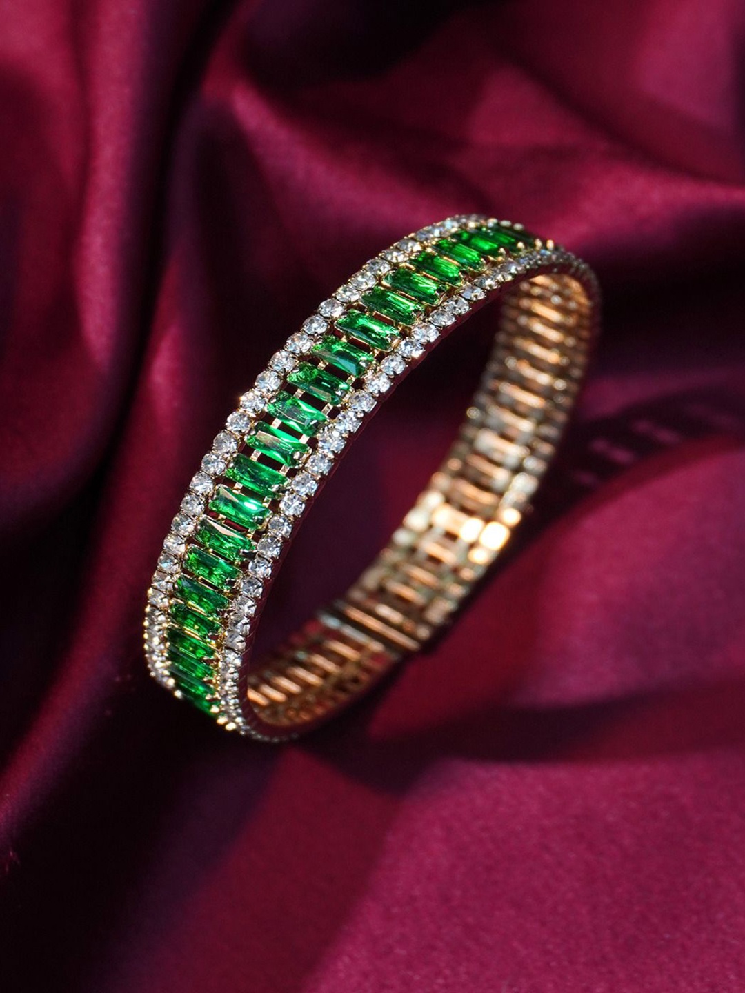 

Niscka Gold Plated Artificial Stones Bangle-Style Bracelet