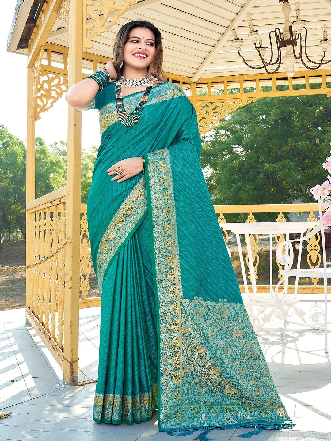 

Ishin Woven Design Striped Zari Saree, Sea green