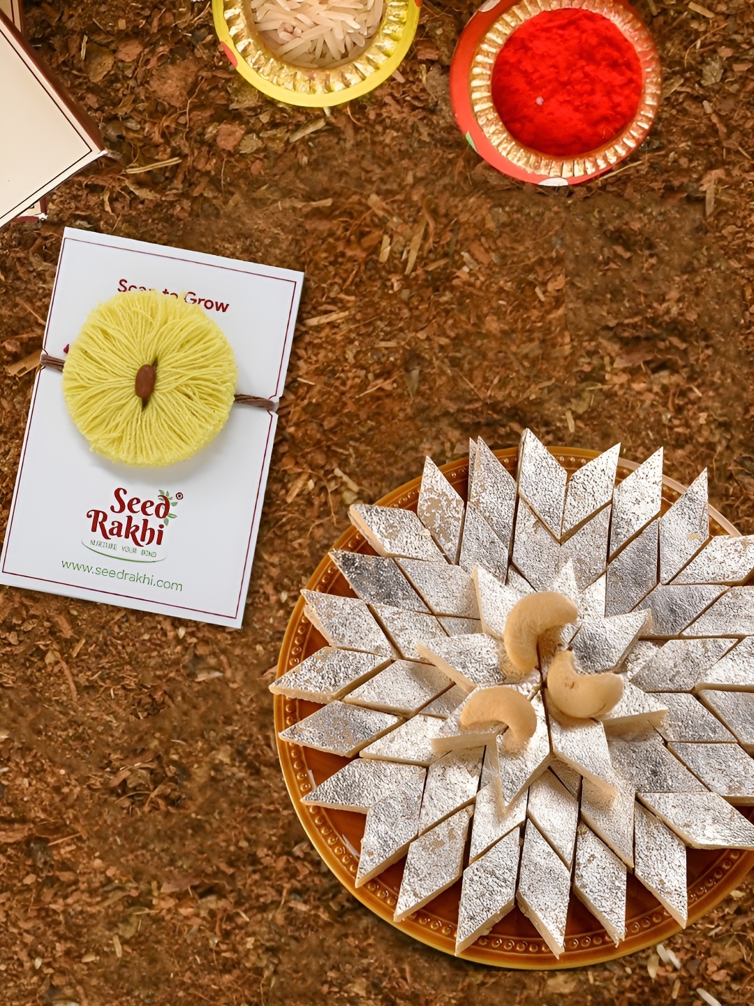 

Indigifts Cotton Seed Rakhi With with Kaju Katli Box, Yellow