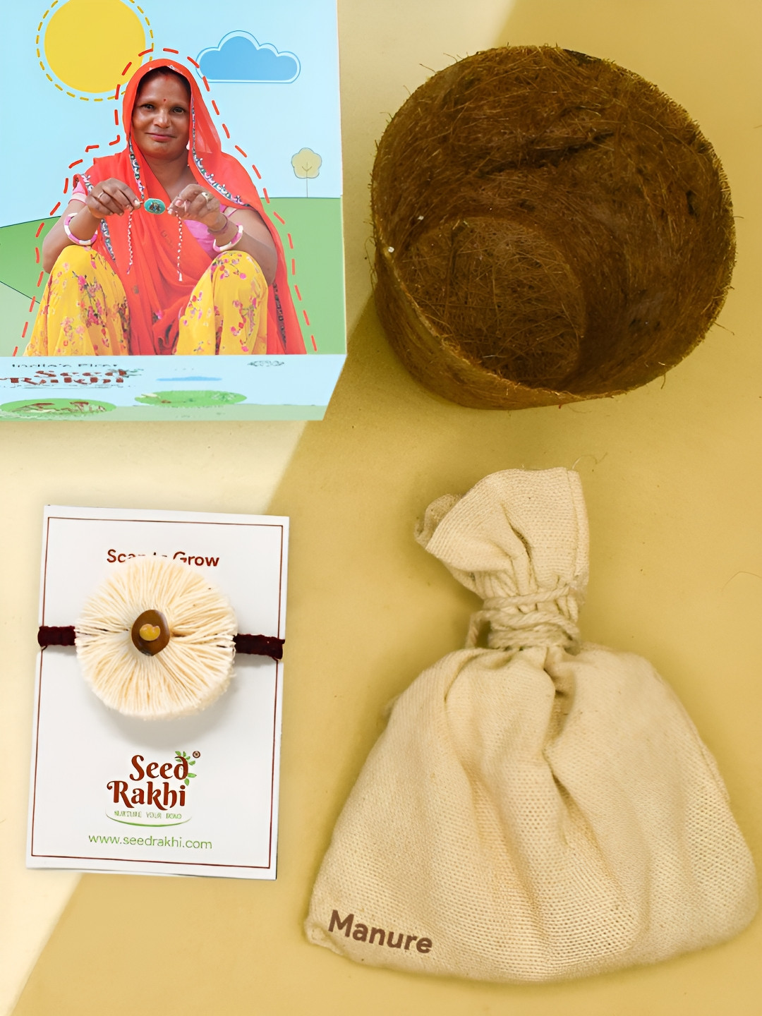 

Indigifts Set Of 3 Seed Rakhi With Planter & Roli Rakhi Gift Set, White