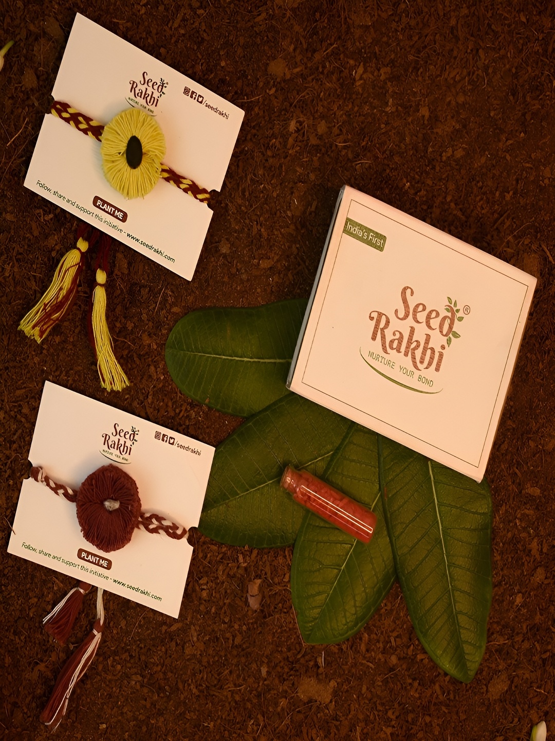 

Indigifts Set Of 2 Eco Friendly Seed Rakhi With Roli Chawal, Maroon