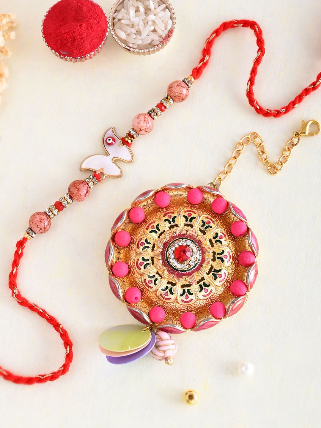

Aapno Rajasthan Butterlfy-Shape Beaded Bhaiya Bhabhi Rakhi With Box, Pink