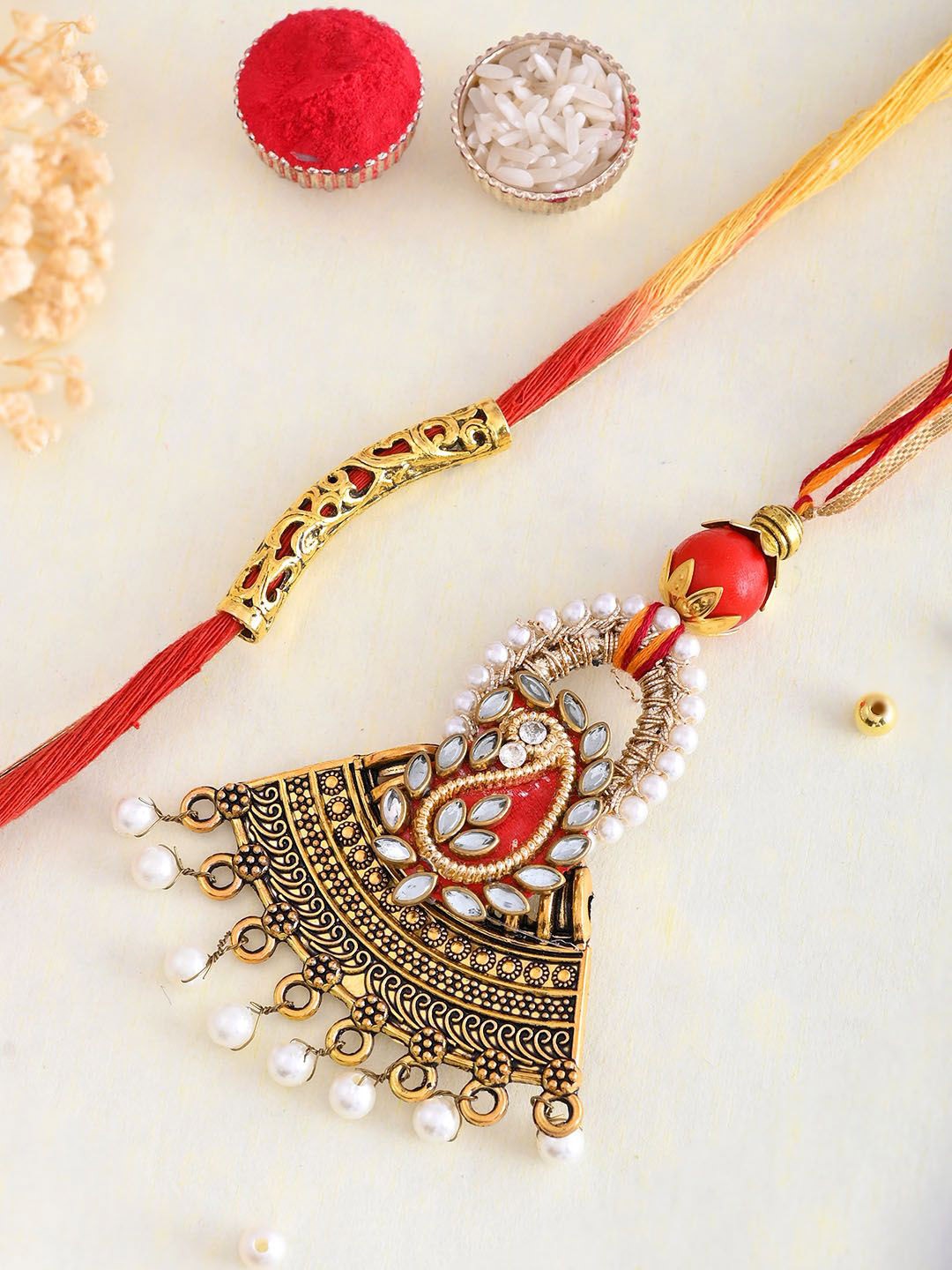 

Aapno Rajasthan Beaded Bhaiya Bhabhi Rakhi With Box, Gold