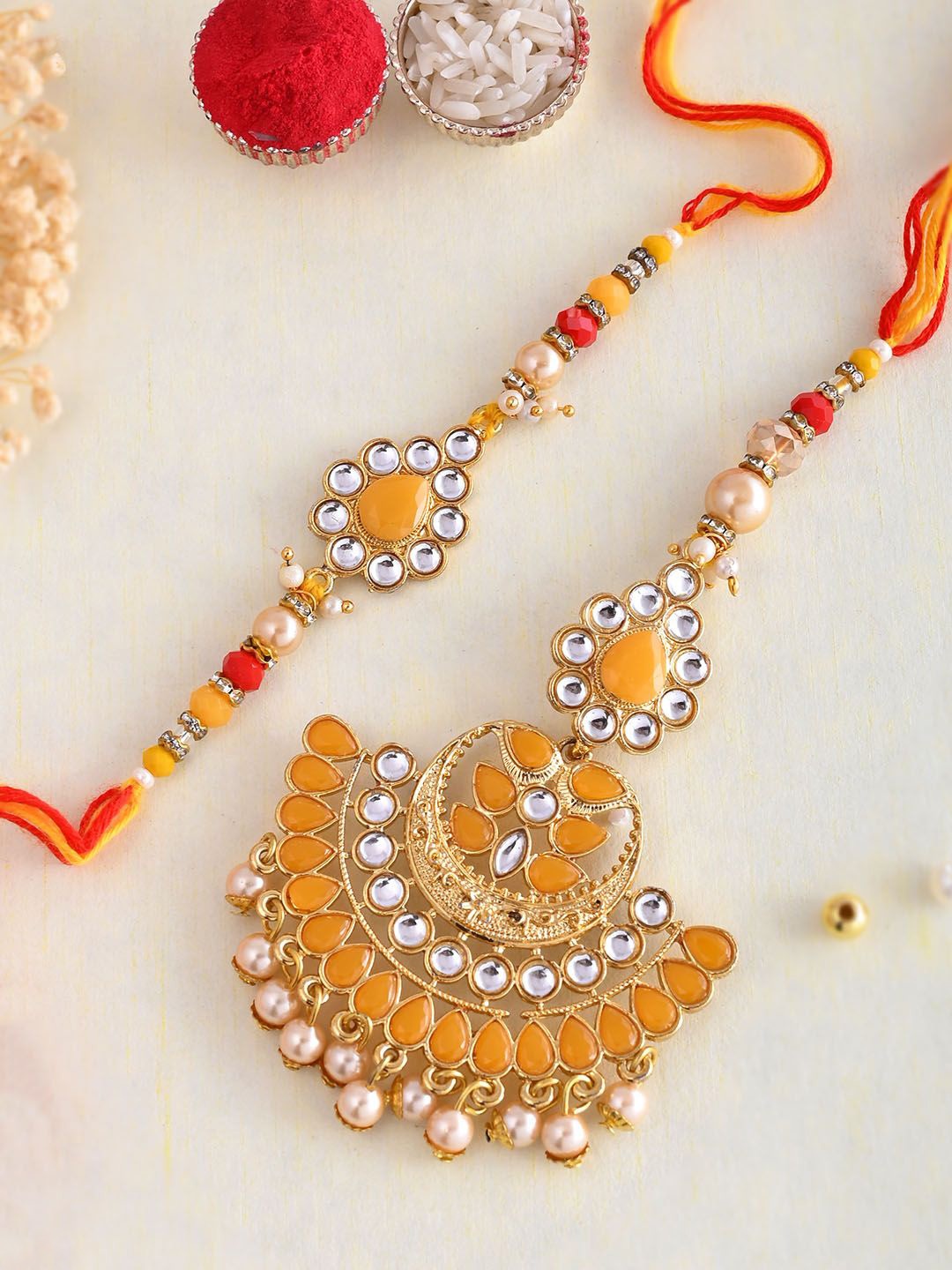 

Aapno Rajasthan Bhaiya Bhabhi Rakhi With Beautiful Box & Roli Chawal, Yellow
