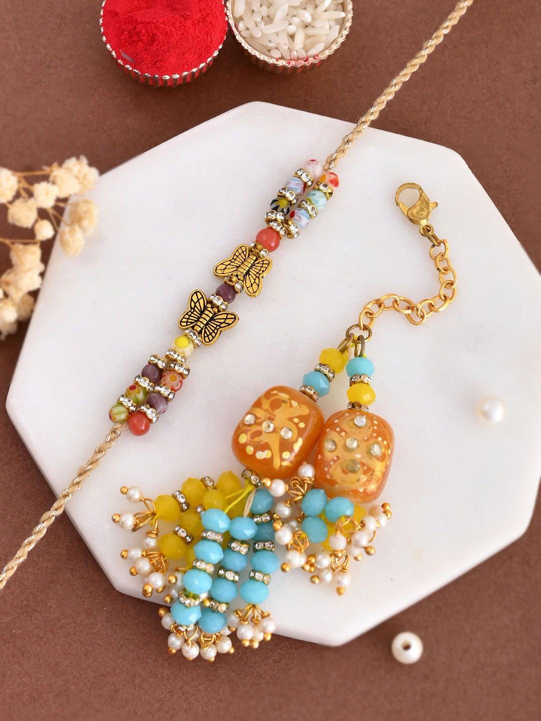 

Aapno Rajasthan Beaded Bhaiya Bhabhi Rakhi With Box, Gold
